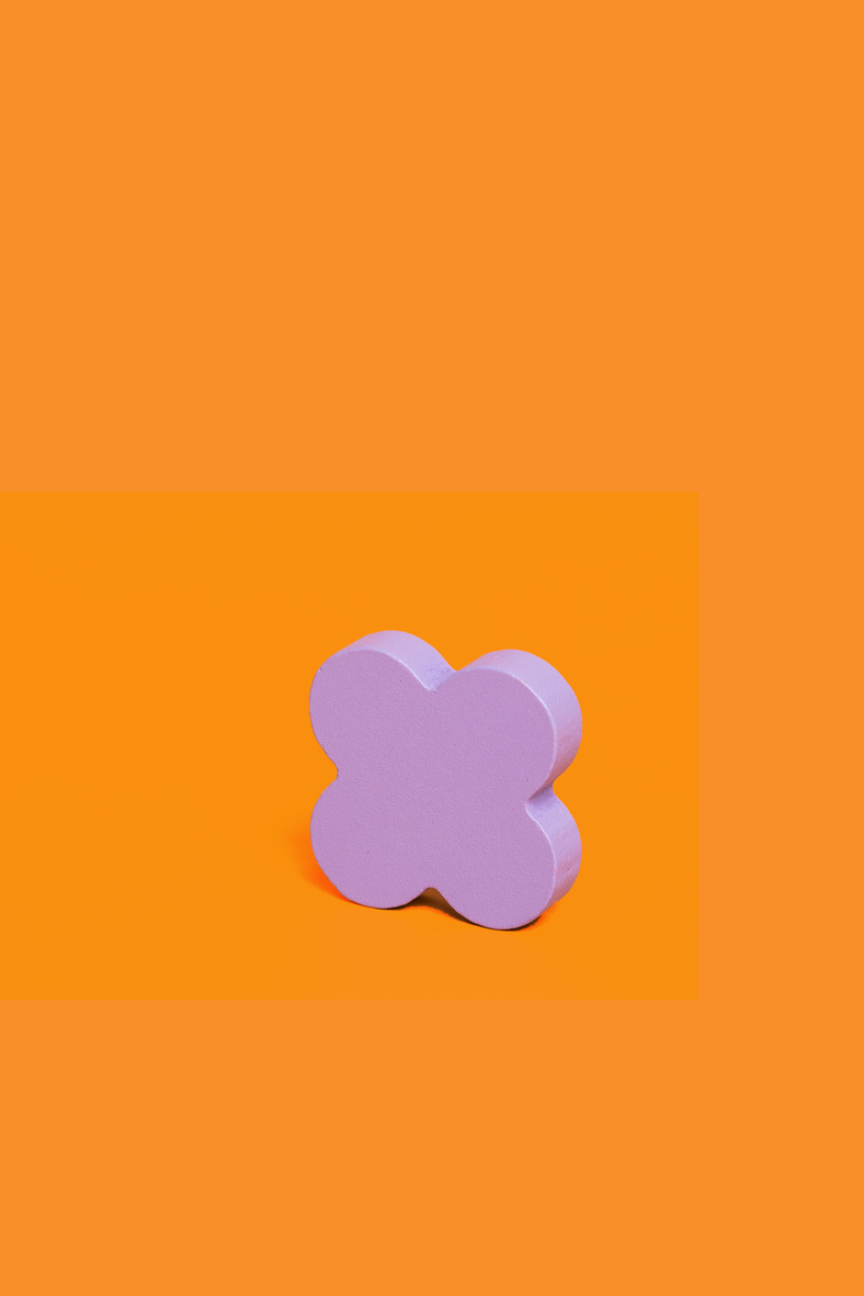 Purple Clover on Orange Background